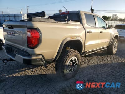 Trzecie zdjęcie samochodu z tyłu: 2023 GMC CANYON AT4X VIN:1GTP6EEK6P1209817 - miniatura
