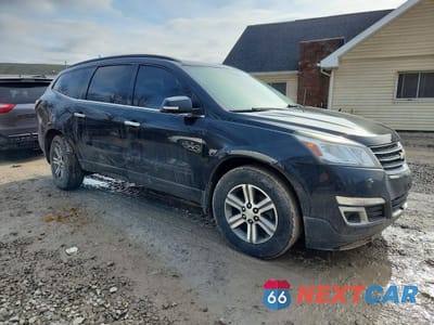 Czwarte zdjęcie samochodu z boku: 2015 CHEVROLET TRAVERSE LT VIN:1GNKVHKD4FJ279178 - miniatura