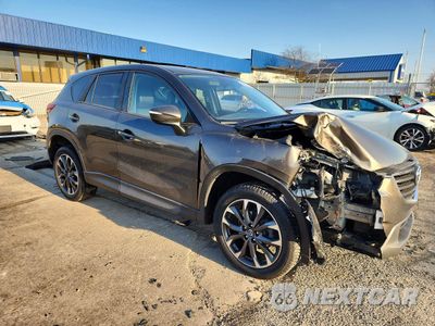 Czwarte zdjęcie samochodu z boku: 2016 MAZDA CX-5 GT VIN:JM3KE4DY4G0771757 - miniatura