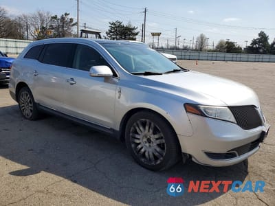 Czwarte zdjęcie samochodu z boku: 2016 LINCOLN TOWNHOUSE MKT VIN:2LMHJ5AT6GBL01824 - miniatura