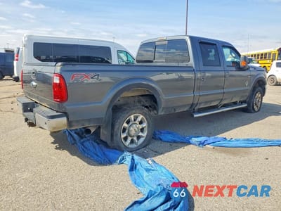 Trzecie zdjęcie samochodu z tyłu: 2015 FORD F350 LARIAT SRW 4WD 6.7L V8 TDSL CREW VIN:1FT8W3BT2FEA80469 - miniatura