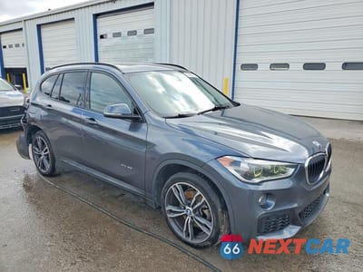 Czwarte zdjęcie samochodu z boku: 2017 BMW X1 XDRIVE28I VIN:WBXHT3C32H5F80132 - miniatura