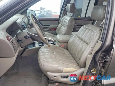 Zdjęcie 7 z 13 samochodu: 2000 JEEP GRAND CHEROKEE LIMITED VIN:1J4GW58N5YC397476 - miniatura