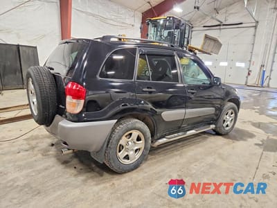 Trzecie zdjęcie samochodu z tyłu: 2002 TOYOTA RAV4 BASE VIN:JTEHH20V926051186 - miniatura