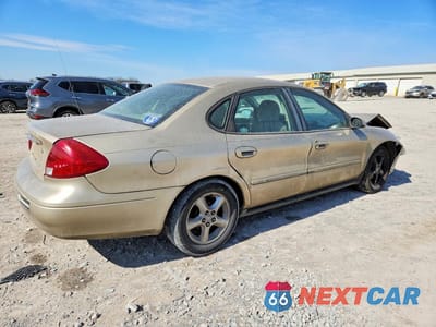 Trzecie zdjęcie samochodu z tyłu: 2000 FORD TAURUS SE VIN:1FAFP5322YA218565 - miniatura