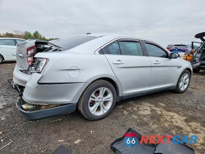 Trzecie zdjęcie samochodu z tyłu: 2015 FORD TAURUS SEL VIN:1FAHP2E82FG105332 - miniatura