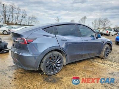 Trzecie zdjęcie samochodu z tyłu: 2023 TESLA MODEL Y VIN:7SAYGAEE8PF616469 - miniatura