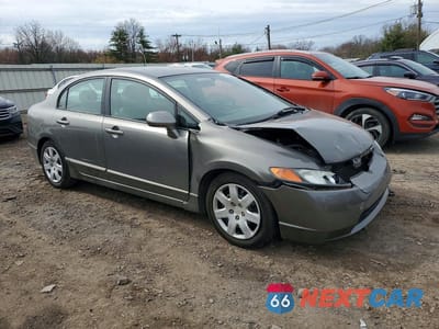 Czwarte zdjęcie samochodu z boku: 2006 HONDA CIVIC LX VIN:1HGFA16596L145675 - miniatura