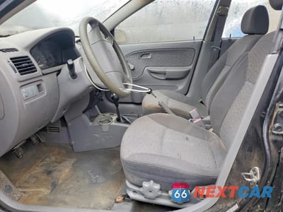 Zdjęcie 7 z 12 samochodu: 2005 KIA RIO BASE VIN:KNADC125356399947 - miniatura