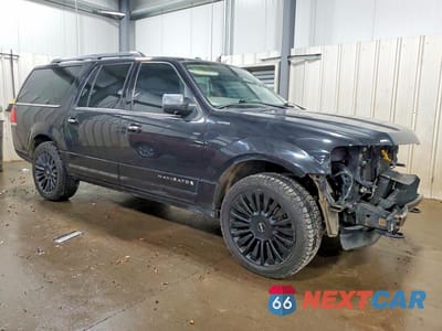 Czwarte zdjęcie samochodu z boku: 2015 LINCOLN NAVIGATOR L VIN:5LMJJ3JT2FEJ07616 - miniatura
