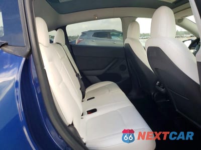 Zdjęcie 11 z 14 samochodu: 2023 TESLA MODEL Y VIN:7SAYGDEE7PF620188 - miniatura