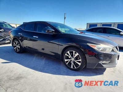 Czwarte zdjęcie samochodu z boku: 2016 NISSAN MAXIMA 3.5 S VIN:1N4AA6AP1GC396003 - miniatura