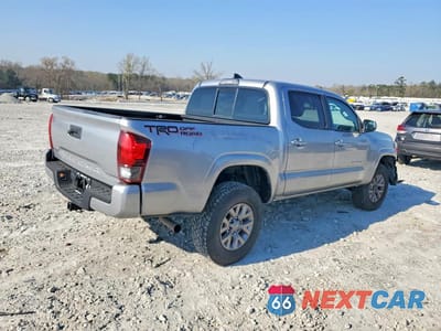 Trzecie zdjęcie samochodu z tyłu: 2019 TOYOTA TACOMA SR VIN:5TFAX5GN8KX137860 - miniatura