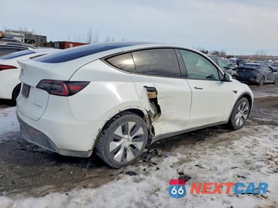 Trzecie zdjęcie samochodu z tyłu: 2022 TESLA MODEL Y VIN:7SAYGAEE6NF518246 - miniatura