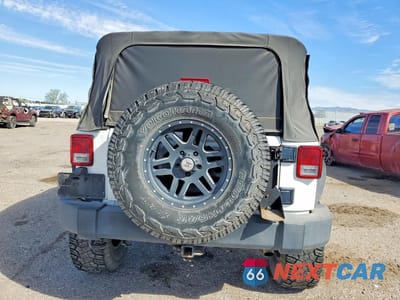 Zdjęcie 6 z 12 samochodu: 2013 JEEP WRANGLER UNLIMITED SPORT VIN:1C4BJWDG4DL630219 - miniatura