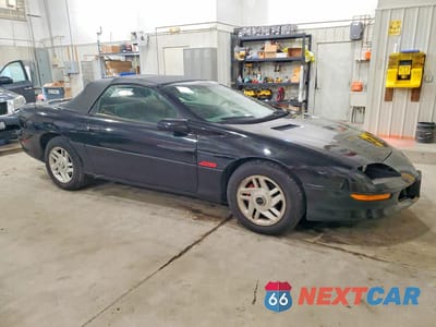 Czwarte zdjęcie samochodu z boku: 1995 CHEVROLET CAMARO Z28 VIN:2G1FP32P2S2149537 - miniatura