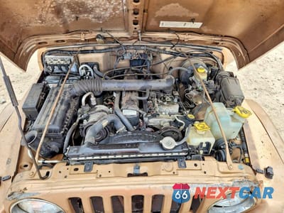 Zdjęcie 11 z 13 samochodu: 1999 JEEP WRANGLER / TJ SAHARA VIN:1J4FY49S4XP450485 - miniatura