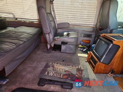 Zdjęcie 11 z 13 samochodu: 1999 GMC SAVANA RV G1500 VIN:1GDFG15R3X1146556 - miniatura
