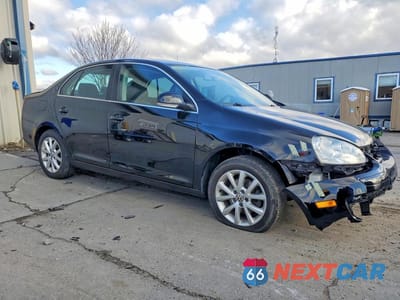 Czwarte zdjęcie samochodu z boku: 2010 VOLKSWAGEN JETTA SE VIN:3VWRZ7AJ3AM036550 - miniatura