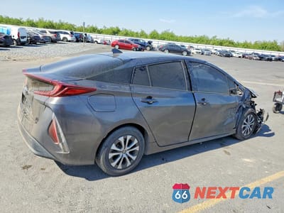 Trzecie zdjęcie samochodu z tyłu: 2021 TOYOTA PRIUS PRIME LE VIN:JTDKAMFP1M3178084 - miniatura