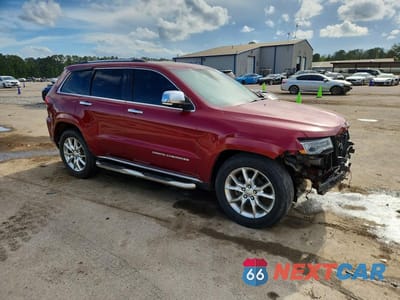 Czwarte zdjęcie samochodu z boku: 2014 JEEP GRAND CHEROKEE SUMMIT VIN:1C4RJEJM2EC424241 - miniatura