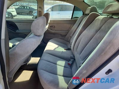 Zdjęcie 10 z 12 samochodu: 2004 HYUNDAI ELANTRA GLS VIN:KMHDN46D14U797972 - miniatura