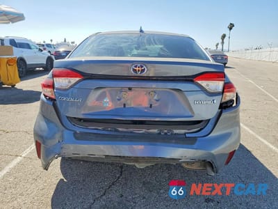 Zdjęcie 6 z 12 samochodu: 2022 TOYOTA COROLLA HYBRID LE VIN:JTDEAMDE3NJ057178 - miniatura