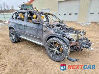 Czwarte zdjęcie samochodu z boku: 2012 BMW X5 XDRIVE35D VIN:5UXZW0C51CL669120 - miniatura