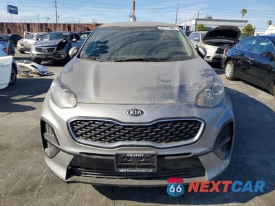 Piąte zdjęcie samochodu w środku: 2021 KIA SPORTAGE LX VIN:KNDPM3AC7M7942007 - miniatura