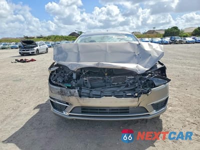 Piąte zdjęcie samochodu w środku: 2019 LINCOLN MKZ VIN:3LN6L5A98KR619133 - miniatura
