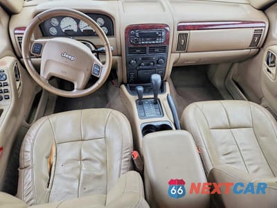 Zdjęcie 8 z 12 samochodu: 2002 JEEP GRAND CHEROKEE LIMITED VIN:1J4GW58J12C281213 - miniatura