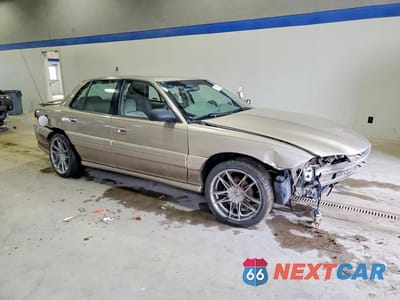 Czwarte zdjęcie samochodu z boku: 1998 PONTIAC GRAND AM SE VIN:1G2NE52T9WM500188 - miniatura