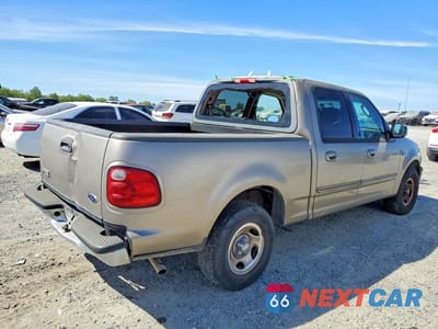 Trzecie zdjęcie samochodu z tyłu: 2002 FORD F150 VIN:1FTRW07622KC35264 - miniatura