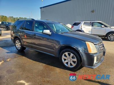 Czwarte zdjęcie samochodu z boku: 2009 CADILLAC SRX VIN:1GYEE437690109934 - miniatura