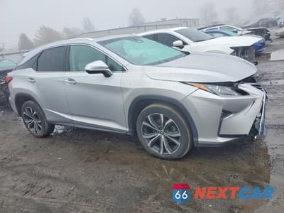 Czwarte zdjęcie samochodu z boku: 2019 LEXUS RX 350 BASE VIN:2T2BZMCA0KC174729 - miniatura