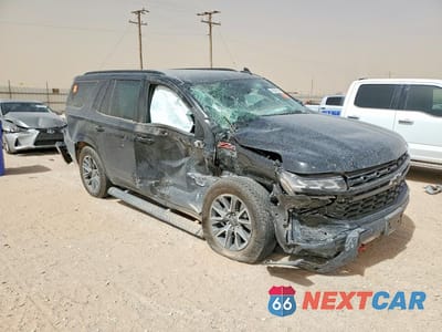 Czwarte zdjęcie samochodu z boku: 2024 CHEVROLET TAHOE K1500 Z71 VIN:1GNSKPKD9RR411604 - miniatura