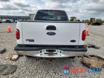 Zdjęcie 6 z 12 samochodu: 2002 FORD F150 SUPERCREW VIN:1FTRW08L12KD39197 - miniatura