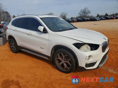 Czwarte zdjęcie samochodu z boku: 2016 BMW X1 XDRIVE28I VIN:WBXHT3Z35G4A50958 - miniatura