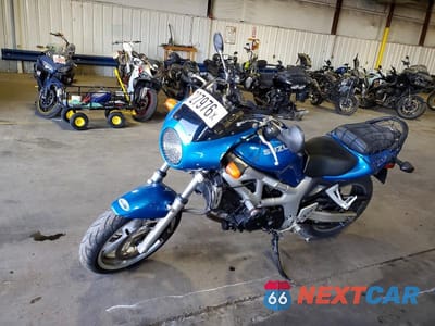 Trzecie zdjęcie samochodu z tyłu: 1999 SUZUKI SV650 VIN:JS1VP52A0X2101374 - miniatura