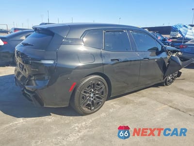 Trzecie zdjęcie samochodu z tyłu: 2026 BMW IX XDRIVE45 VIN:WB543CF08TCW71917 - miniatura
