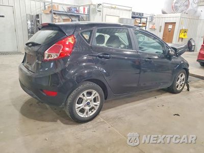 Trzecie zdjęcie samochodu z tyłu: 2015 FORD FIESTA SE VIN:3FADP4EJ7FM145943 - miniatura