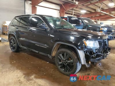 Czwarte zdjęcie samochodu z boku: 2013 JEEP GRAND CHEROKEE LAREDO VIN:1C4RJFAG1DC580883 - miniatura