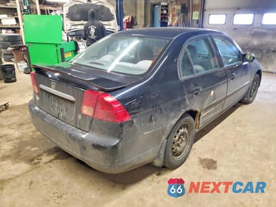 Trzecie zdjęcie samochodu z tyłu: 2002 HONDA CIVIC LX VIN:2HGES16852H942404 - miniatura