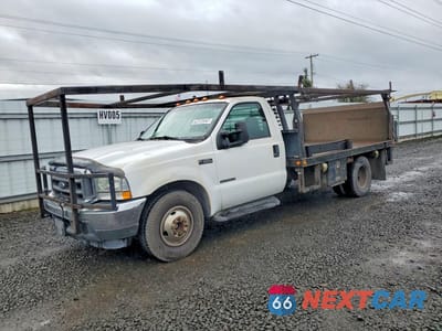 2003 FORD F350 SUPER DUTY FLATBED TRUCK 1FDWF36F43EA94229 - główne zdjęcie licytacji z USA - miniatura