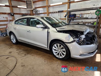 Czwarte zdjęcie samochodu z boku: 2014 BUICK LACROSSE VIN:1G4GB5G31EF305741 - miniatura
