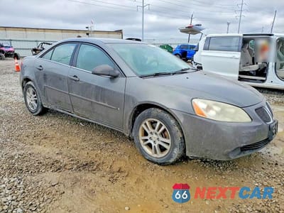 Czwarte zdjęcie samochodu z boku: 2006 PONTIAC G6 SE1 VIN:1G2ZG558064127254 - miniatura