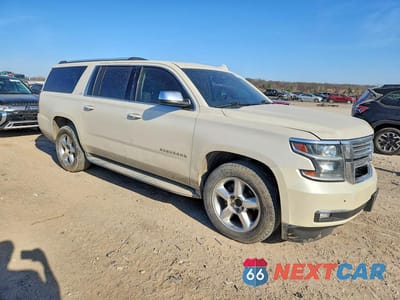 Czwarte zdjęcie samochodu z boku: 2015 CHEVROLET SUBURBAN K1500 LTZ VIN:1GNSKKKC1FR721655 - miniatura