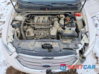 Zdjęcie 11 z 13 samochodu: 2018 FORD TAURUS SEL VIN:1FAHP2E88JG129434 - miniatura