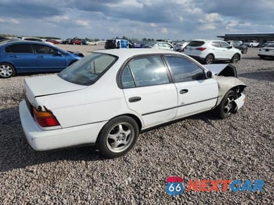 Trzecie zdjęcie samochodu z tyłu: 1995 TOYOTA COROLLA DX VIN:1NXAE09B7SZ316433 - miniatura