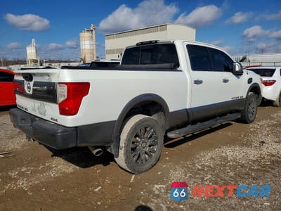 Trzecie zdjęcie samochodu z tyłu: 2017 NISSAN TITAN XD PLATINUM RESERVE VIN:1N6BA1F46HN539899 - miniatura